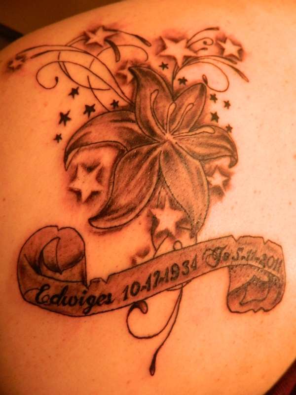 Flower with ribon tattoo