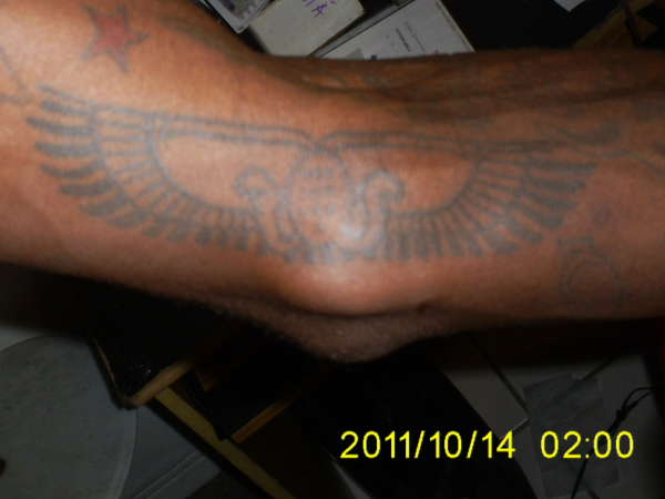 Wing Disc tattoo