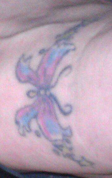 butterfly on foot tattoo
