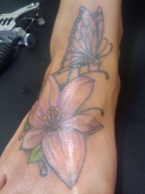 flower/ butterfly tattoo