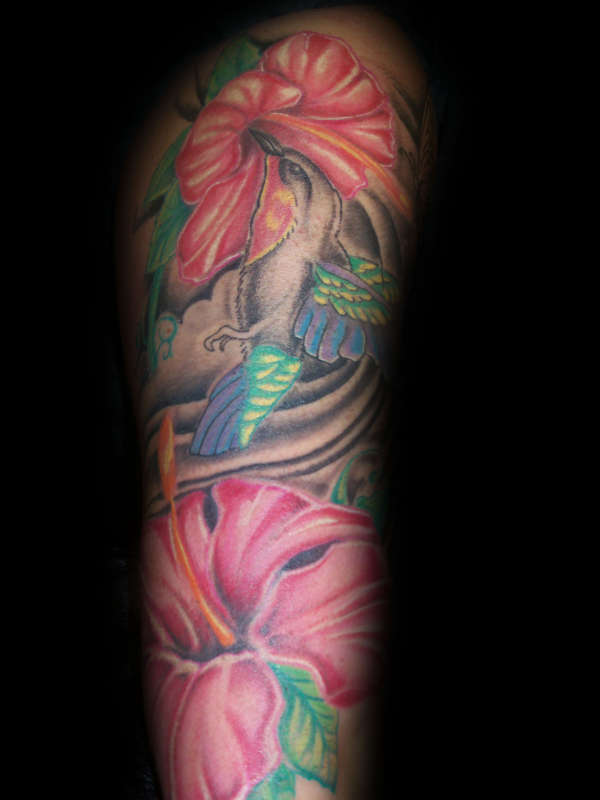 girls arm tattoo