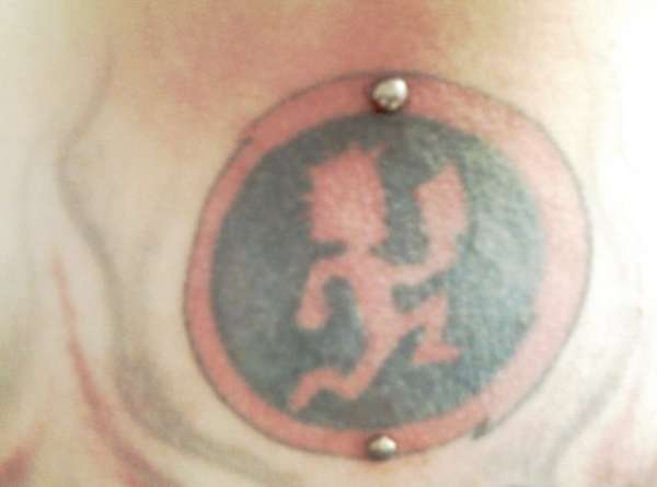 hatchetman with micro dermals tattoo