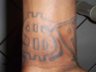 money wrist tattoo