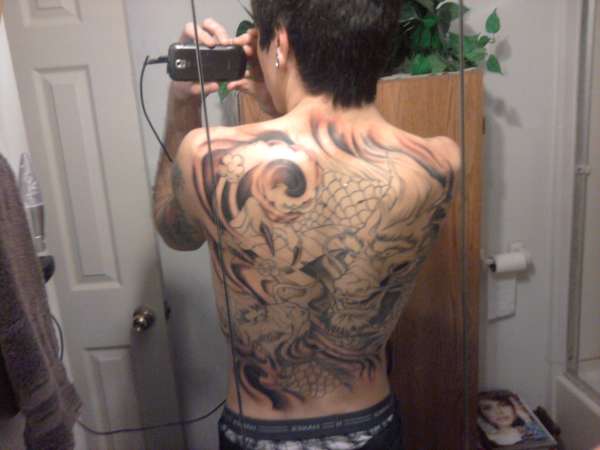 Back piece tattoo