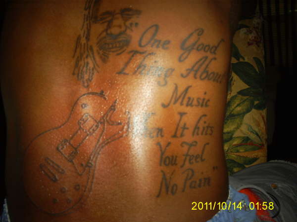 Bob Marley piece part 3 ( guitar) tattoo