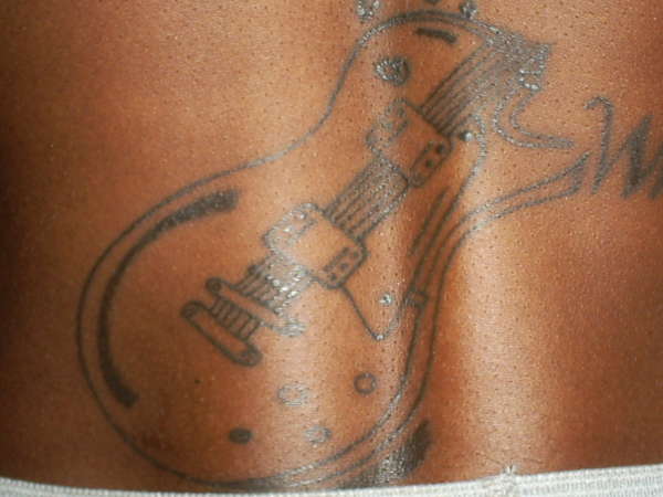 Bob Marley piece part 4 ( close up guitar) tattoo