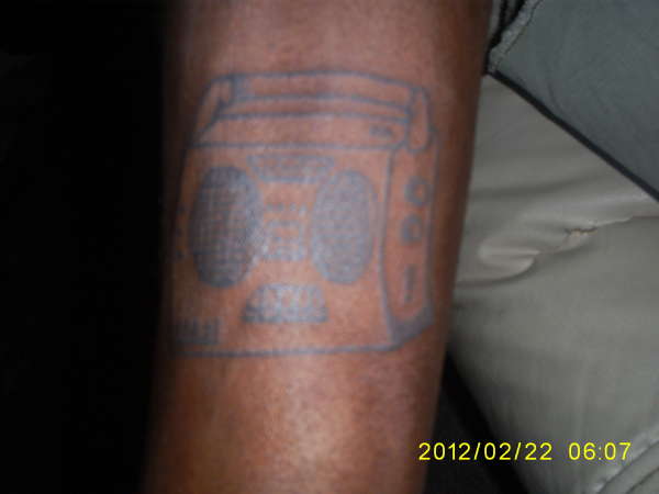Boombox (leg) tattoo