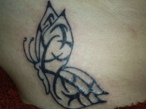 Butterfly w/ Tribal pattern tattoo