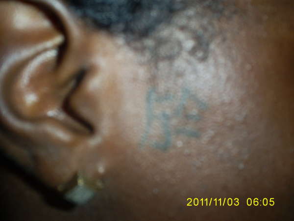 In One Ear.....(chinese symbol for IN) tattoo