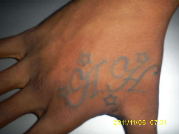 Initials and Stars tattoo