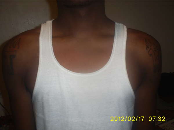 Initials w/ flames (shoulders) tattoo