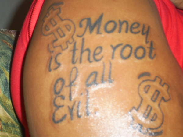 Money is the root of All evil tattoo.