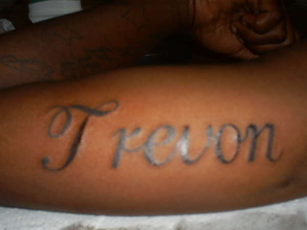 Name on inside of arm tattoo