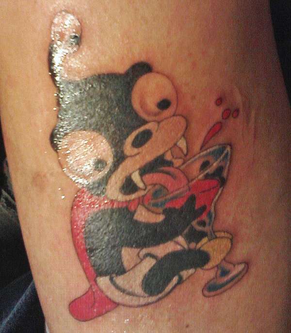 Nora Lord Nibbler with cocktail tattoo