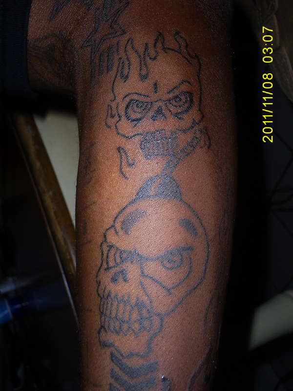 Skulls (part of sleeve) tattoo