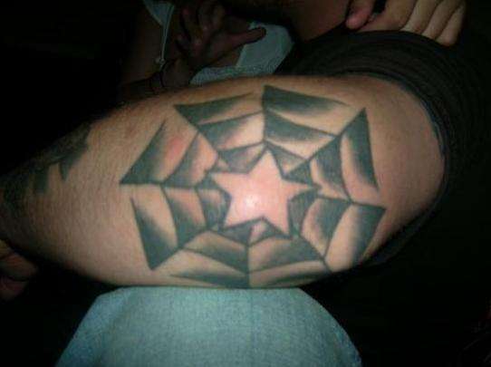 Spiderweb elbow tattoo
