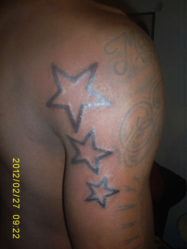 Stars on back of arm ( arm 2) tattoo