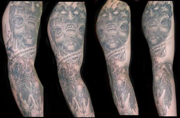 evil arm tattoo