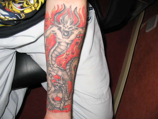 Demon Battle With Firery Background tattoo