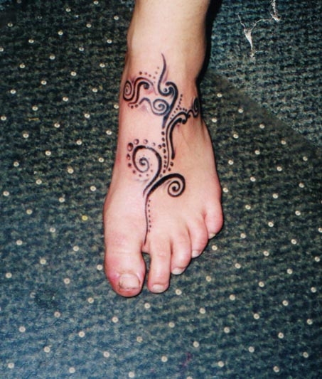 brimstone tribal foot tattoo