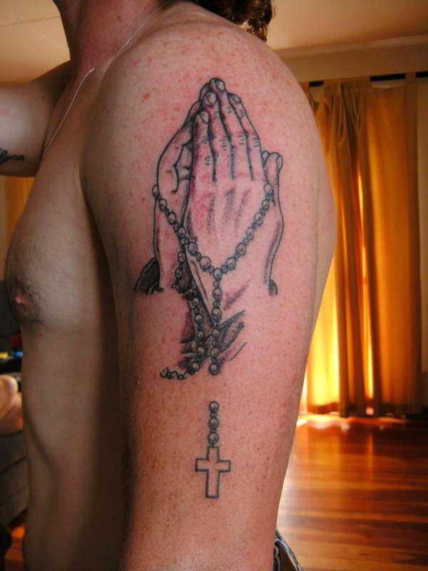 praying hands tattoo