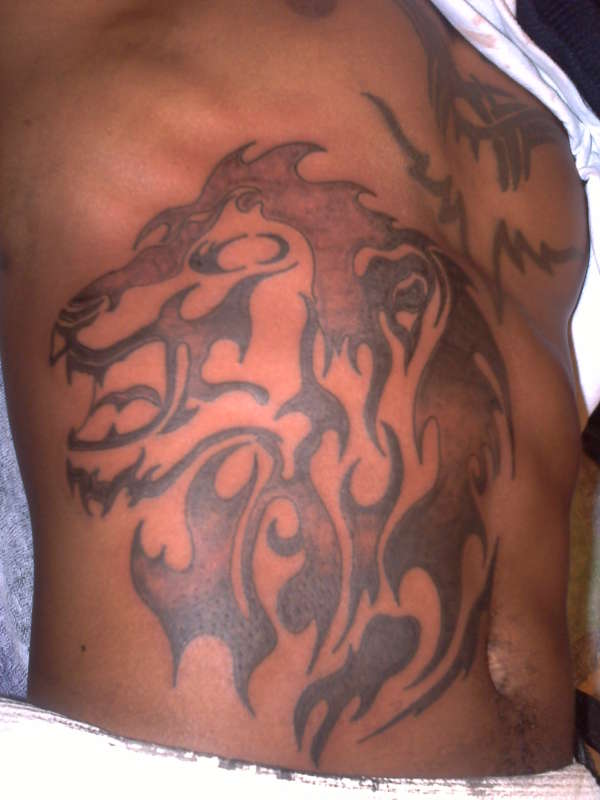 tribal lion tattoo