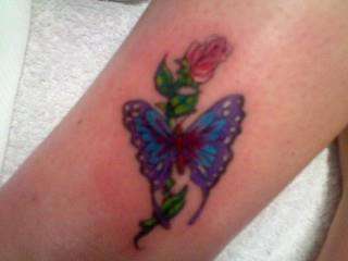 Butterly with rose tattoo