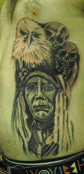 Indian and Feathers on side tattoo