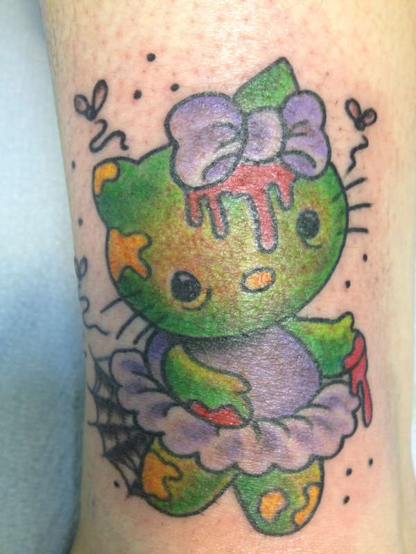 Morbid Hello Kitty tattoo