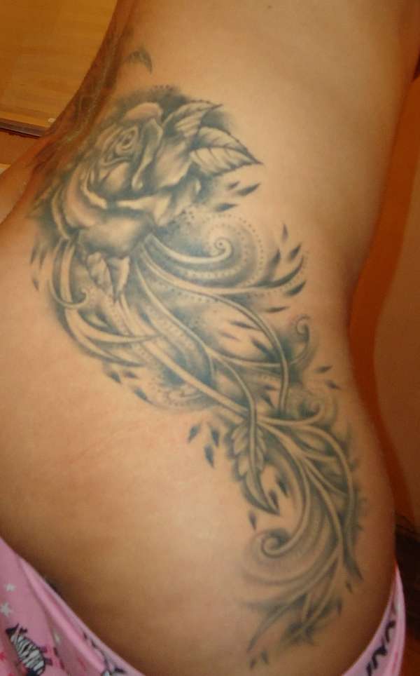 One side off Tattoo tattoo
