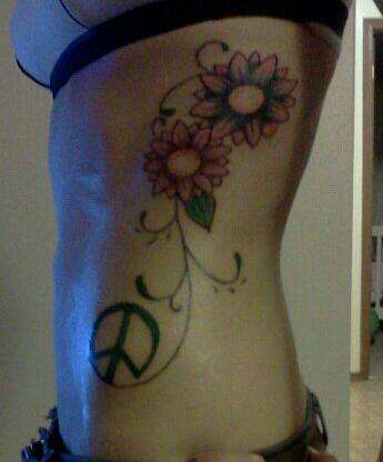 Peace& flowers tattoo