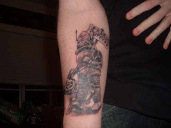 Robot with robodog tattoo