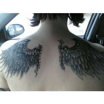 Sewn on angel wing back tattoo tattoo
