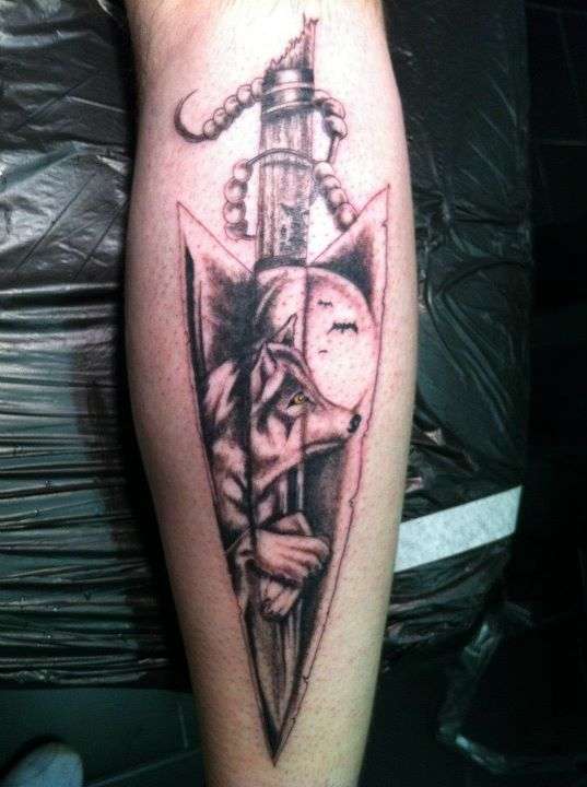 Wolf Arrowhead tattoo