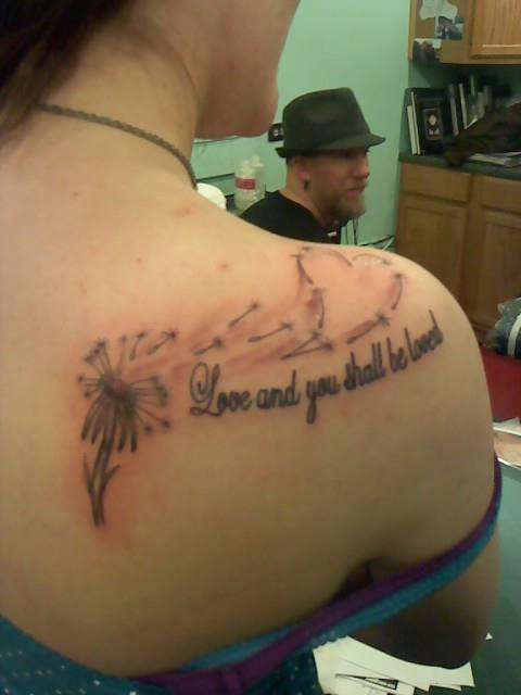 dandelion to symbolize freedom, happiness, and love tattoo