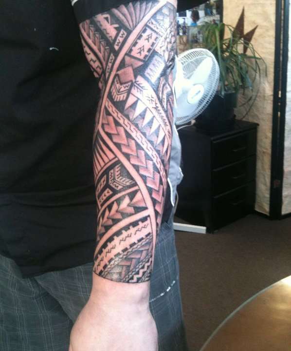 island sleeve colored tattoo