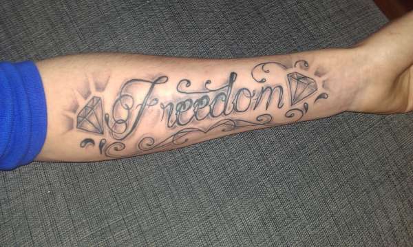 Freedom Forearm Tattoo tattoo