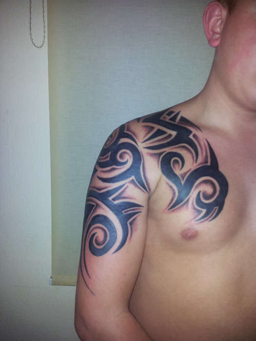 My tribal chest to arm tattoo pic2! ;D tattoo