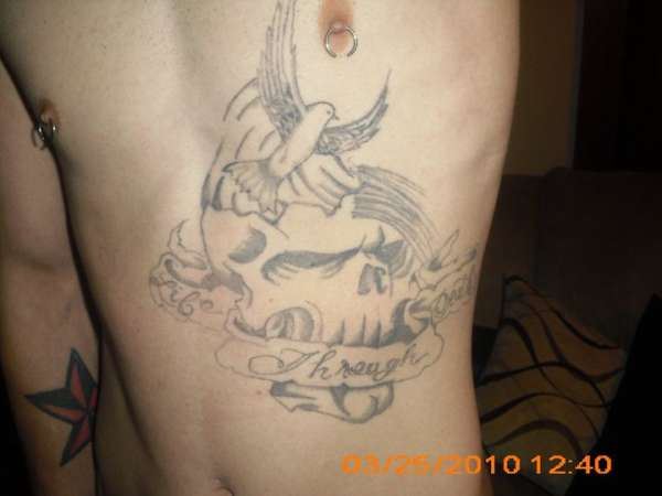 Skull w/ Bird tattoo
