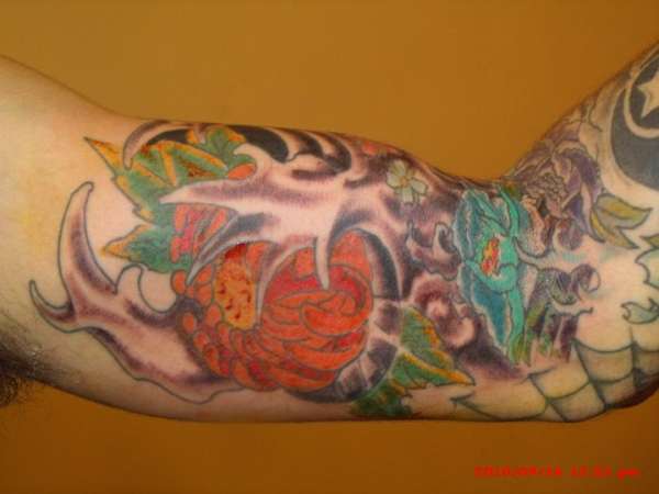 arm sleeve tattoo