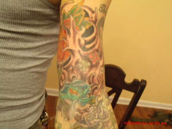 arm sleeve tattoo