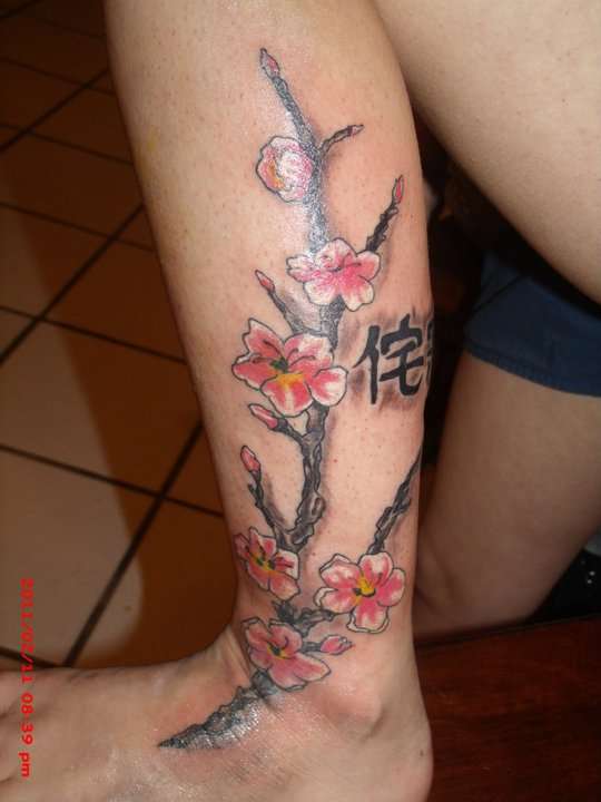 dog wood flowers tattoo