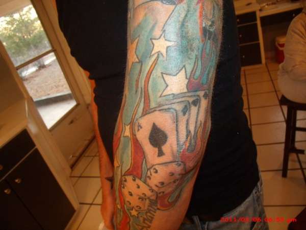 gambler sleeve tattoo