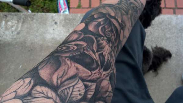 left arm sleeve tattoo