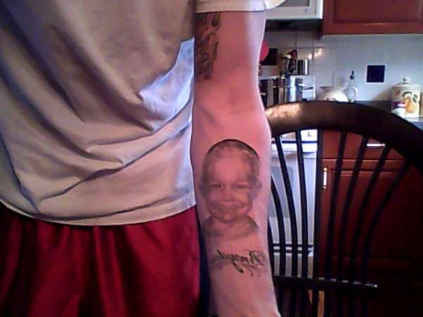 my sons portrait tattoo