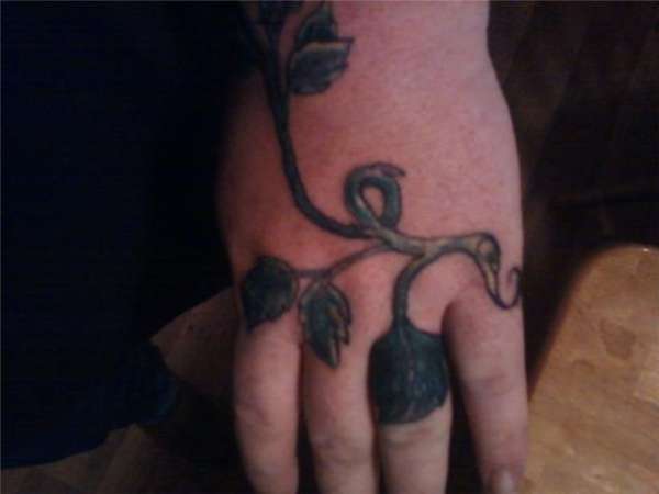 rose and vine tattoo