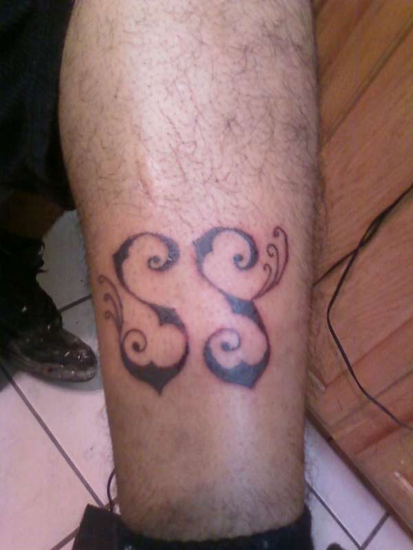 JOHNNIE'S LEG tattoo