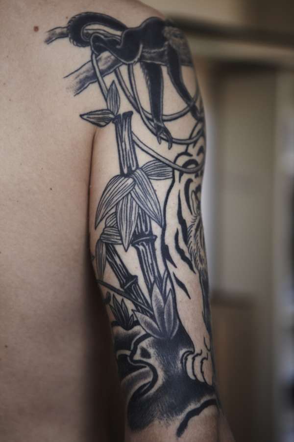 bamboo tree and monkey tattoo