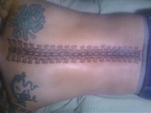 biomechanical spine tattoo