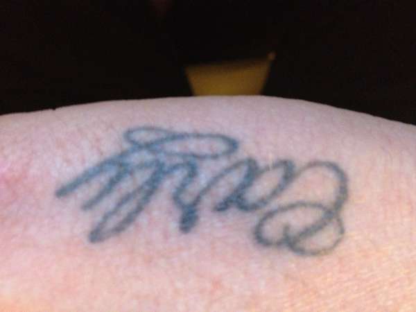 daughters name on right hand tattoo